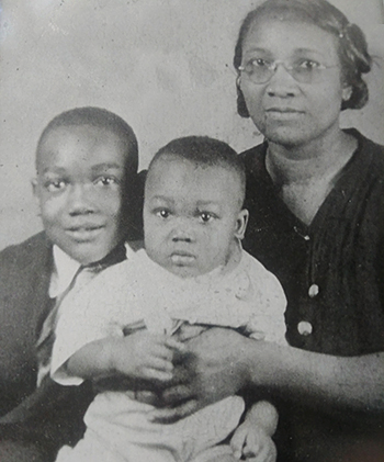 photo of Obie Bender with his mother and brother